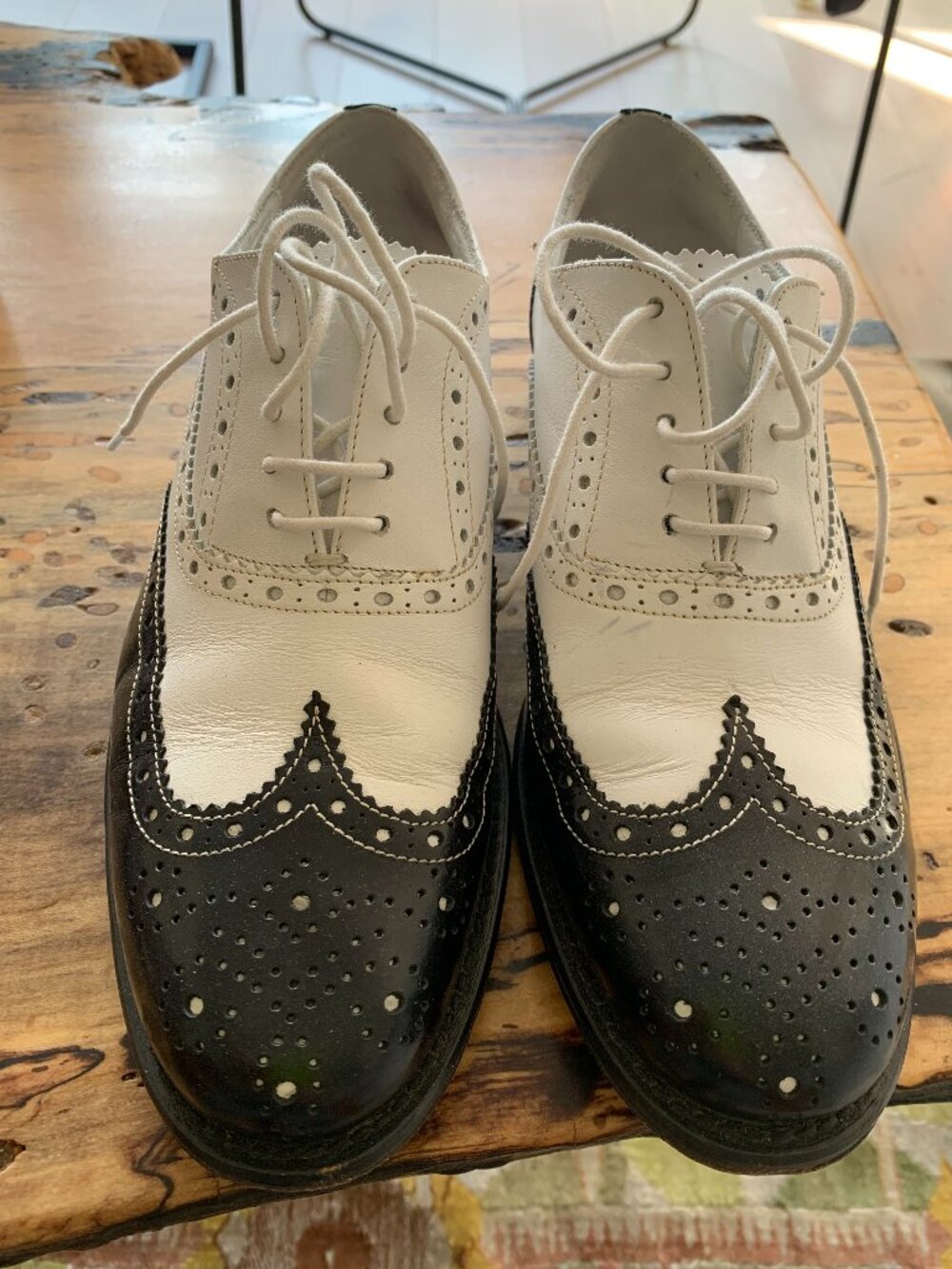Black/white spectator flats, size 37.